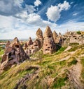 Unreal world of Cappadocia. Splendid summer view of Uchisar Castle. Sunny morning scene of famous Uchisar village, district of Nev