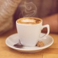 Unrecognisable man drinking coffee and having breakfast. Royalty Free Stock Photo