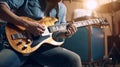 Unrecognisable man playing the guitar in a music studio. Generative AI