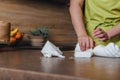 Unrecognisable woman preparing white fondant for cake decorating, hands detail. DIY, sequence, step by step, part of series. Royalty Free Stock Photo