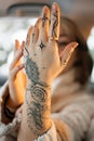 Unrecognisable young lady with painted hand sacral mehendi