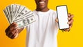 Unrecognizable african american man holding bunch of money Royalty Free Stock Photo