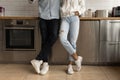 Unrecognizable African couple standing on tiled floor in kitchen Royalty Free Stock Photo
