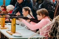 Unrecognizable Belarusian secondary school pupils girls shooting