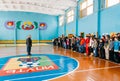 Unrecognizable Belarusian secondary school pupils lined up in th