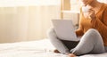 Unrecognizable Black Woman Using Laptop Having Morning Coffee In Bed Royalty Free Stock Photo