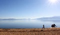 Unrecognizable boy running on the beach of lake prespa in macedonia Royalty Free Stock Photo