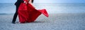 unrecognizable bride and groom dancing on the beach Royalty Free Stock Photo