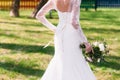 Unrecognizable bride hurry to groom, outdoor Royalty Free Stock Photo