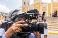 An unrecognizable cameraman films footage of a religious activity in Nicaragua during Holy Week Royalty Free Stock Photo