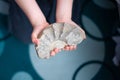 Unrecognizable child hold a fossil in hands