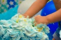 Little hands smashing cake in birthday Royalty Free Stock Photo