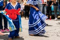 Unrecognizable children dressed in classic Nicaraguan clothes on the street