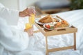 Unrecognizable Couple Having Breakfast In Bed, Closeup Of Table Tray Royalty Free Stock Photo