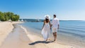 Unrecognizable couple in silhouette savoring a blissful summer day at the picturesque beach