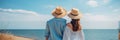 Unrecognizable couple in summer attire joyfully embraces the beauty of a bright beach day
