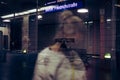 Unrecognizable and defocused commuters on the Berlin u-bahn or Metro wearing FFP2 masks