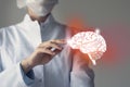 Unrecognizable doctor caring highlighted blue handrawn Brain. Medical illustration, template, science mockup Royalty Free Stock Photo