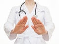 Unrecognizable doctor showing disabling gesture