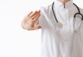 Unrecognizable doctor showing disabling gesture