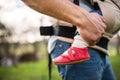 Unrecognizable father with his toddler daughter in a baby carrier outside. Royalty Free Stock Photo