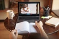 Unrecognizable female student having online call with teacher Royalty Free Stock Photo