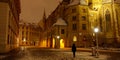 Unrecognizable female tourist marvels at the breathtaking Minoriten Church.