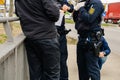 Unrecognizable German Polizei Police officers checks people at the border
