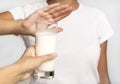 Unrecognizable Girl Gesturing No To Milk Glass, White Background, Cropped Royalty Free Stock Photo