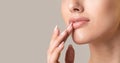 Unrecognizable Girl Touching Lips Over Beige Studio Background, Panorama, Cropped Royalty Free Stock Photo