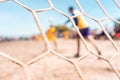 Unrecognizable goalkeeper throwing the ball during a soccer game on a beach in Masachapa, Nicaragua. Concept of popular
