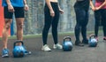 Unrecognizable group of athletes with kettlebells Royalty Free Stock Photo