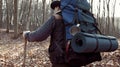 Unrecognizable hiker carrying backpack