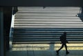 Unrecognizable lonely person silhouette walking