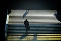 Lonely person silhouette walking upstairs Royalty Free Stock Photo