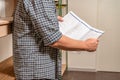 Unrecognizable man checking a list of tasks or products in a warehouse Royalty Free Stock Photo