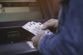 Unrecognizable man counting euros withdrawn from ATM. Man withdraws cash from bank Royalty Free Stock Photo