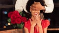 Unrecognizable Man Covering Girlfriend`s Eyes Holding Bouquet In Restaurant, Panorama