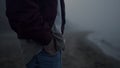 Unrecognizable man dancing ocean beach. Active guy moving hands closeup Royalty Free Stock Photo