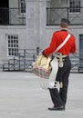 Drummer boy dressed as a British Military Garrison uniform with a brass drum