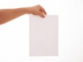 Unrecognizable man holding an empty sheet of paper Royalty Free Stock Photo