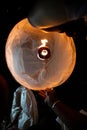 Unrecognizable man releasing paper lantern during Loi Krathong and Yi Peng festival in Chian Mai Royalty Free Stock Photo