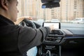 unrecognizable man use empty touchscreen display with copyspace. modern technologies, driving and parking safety. Close up,