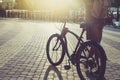 Unrecognizable Man Walks With A Bicycle On The Summer Square In The Morning Daily Routine Lifestyle Royalty Free Stock Photo