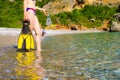 Woman with flippers snorkeling tube on beach Royalty Free Stock Photo