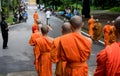 unrecognizable monk walking on street. Royalty Free Stock Photo