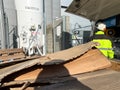 Unrecognizable nitrogen tank filling technician preparing the truck and stopcocks for refueling liquid nitrogen at a company