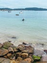 Unrecognizable people diving at Praia Da Miseria, Bombinhas, Brazil