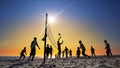 Unrecognizable people play Volleyball on the beach