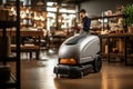 Unrecognizable person cleaning office floor, detailed middle wide shot with blurred background